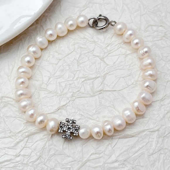 Tory Burch Jewelry - Tory Burch Elegant Pearl bracelet with Silver tory Burch logo with diamond